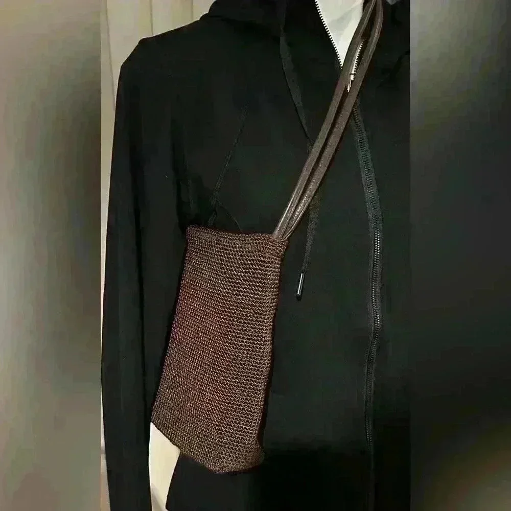 The Sak crochet brown woven shoulder bag / hobo handbag.